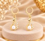 Golden Swan Pearl Dangle Earrings - Image 2